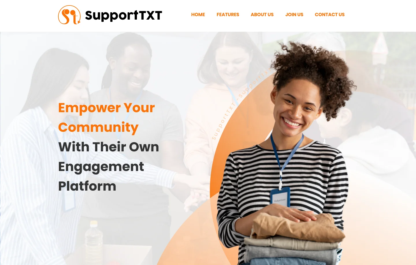 SupportTXT homepage: “Empower your community with their own engagement platform” beside a smiling volunteer.